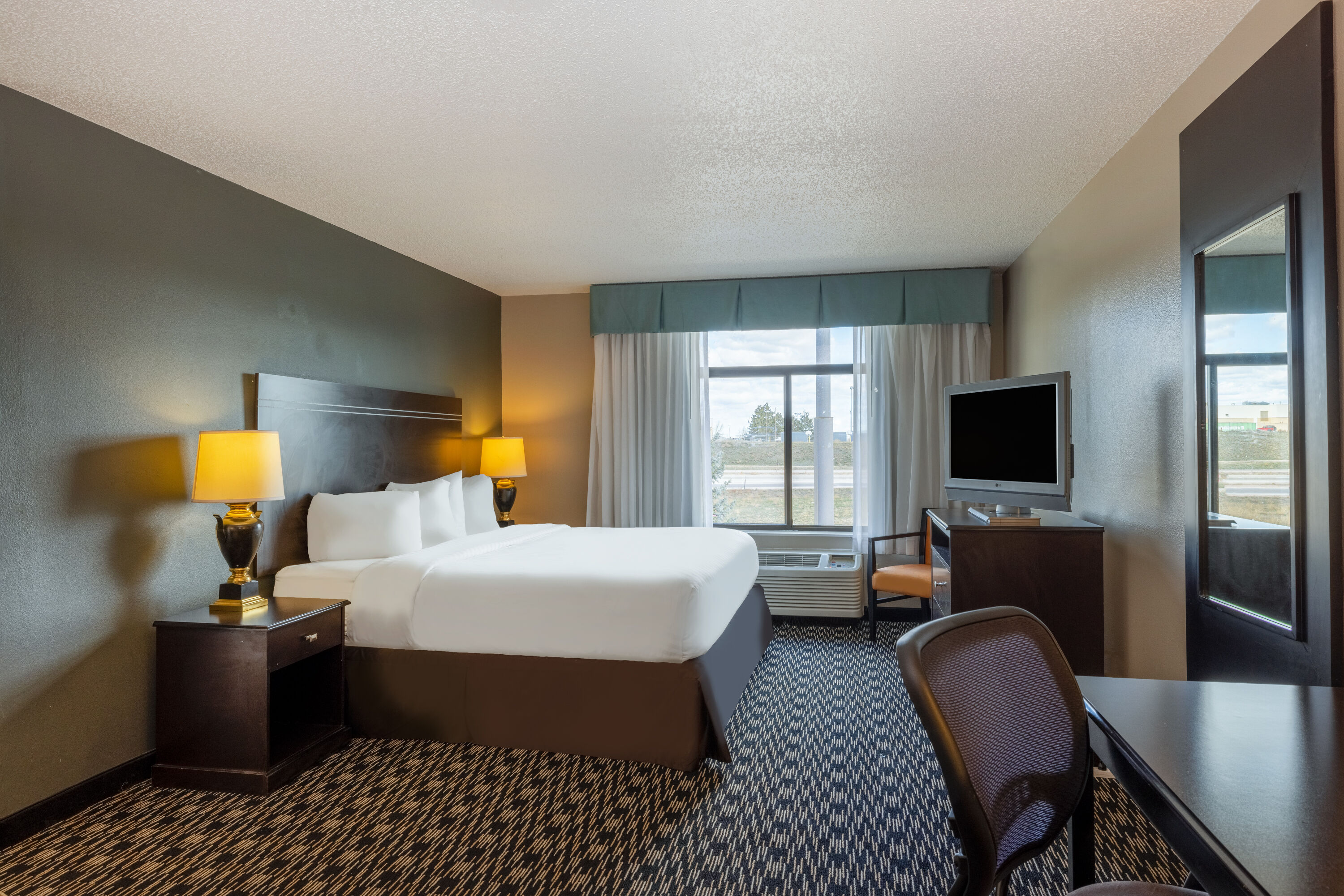 Guest room at the Wingate by Wyndham Gillette in Gillette, Wyoming