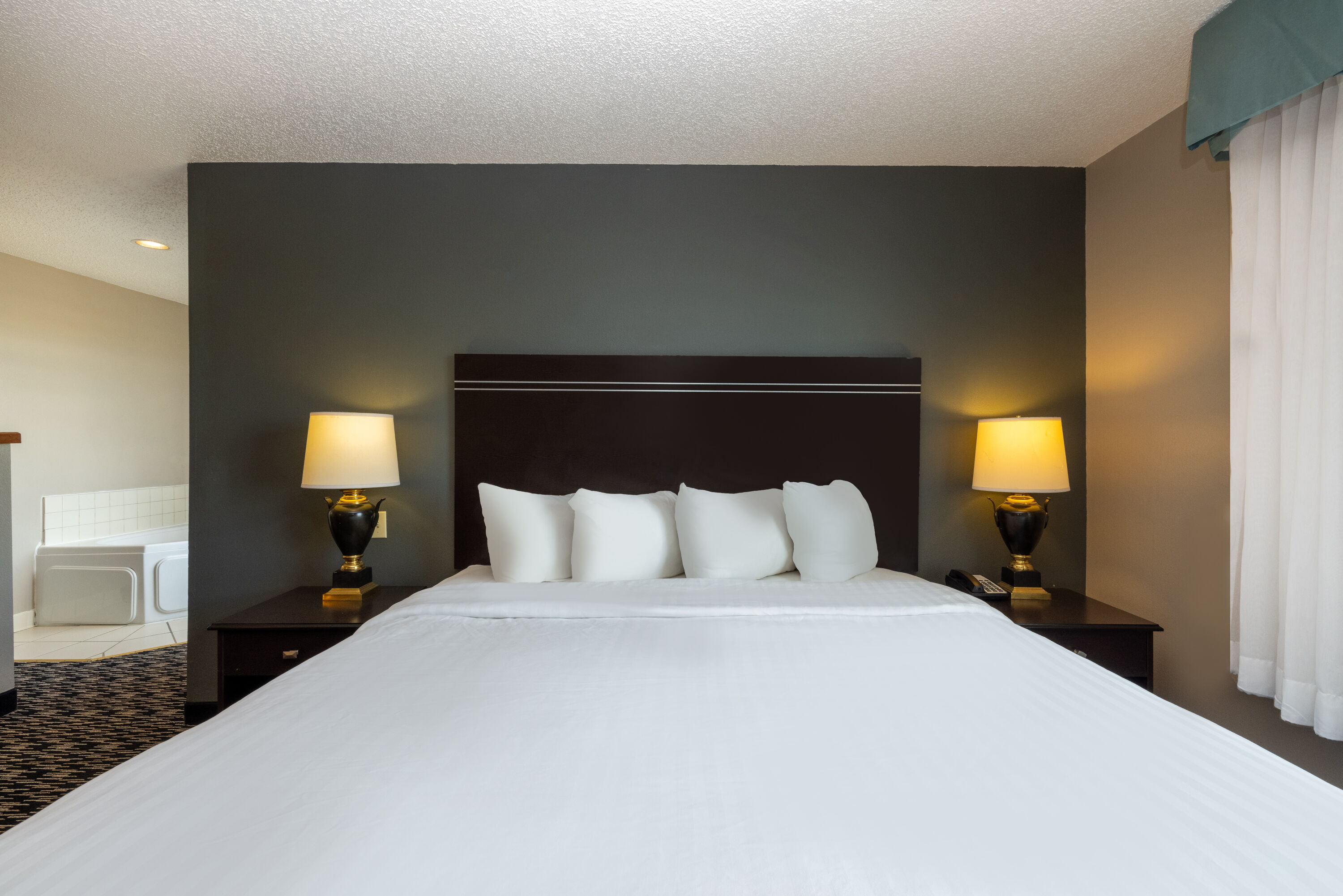 Guest room at the Wingate by Wyndham Gillette in Gillette, Wyoming