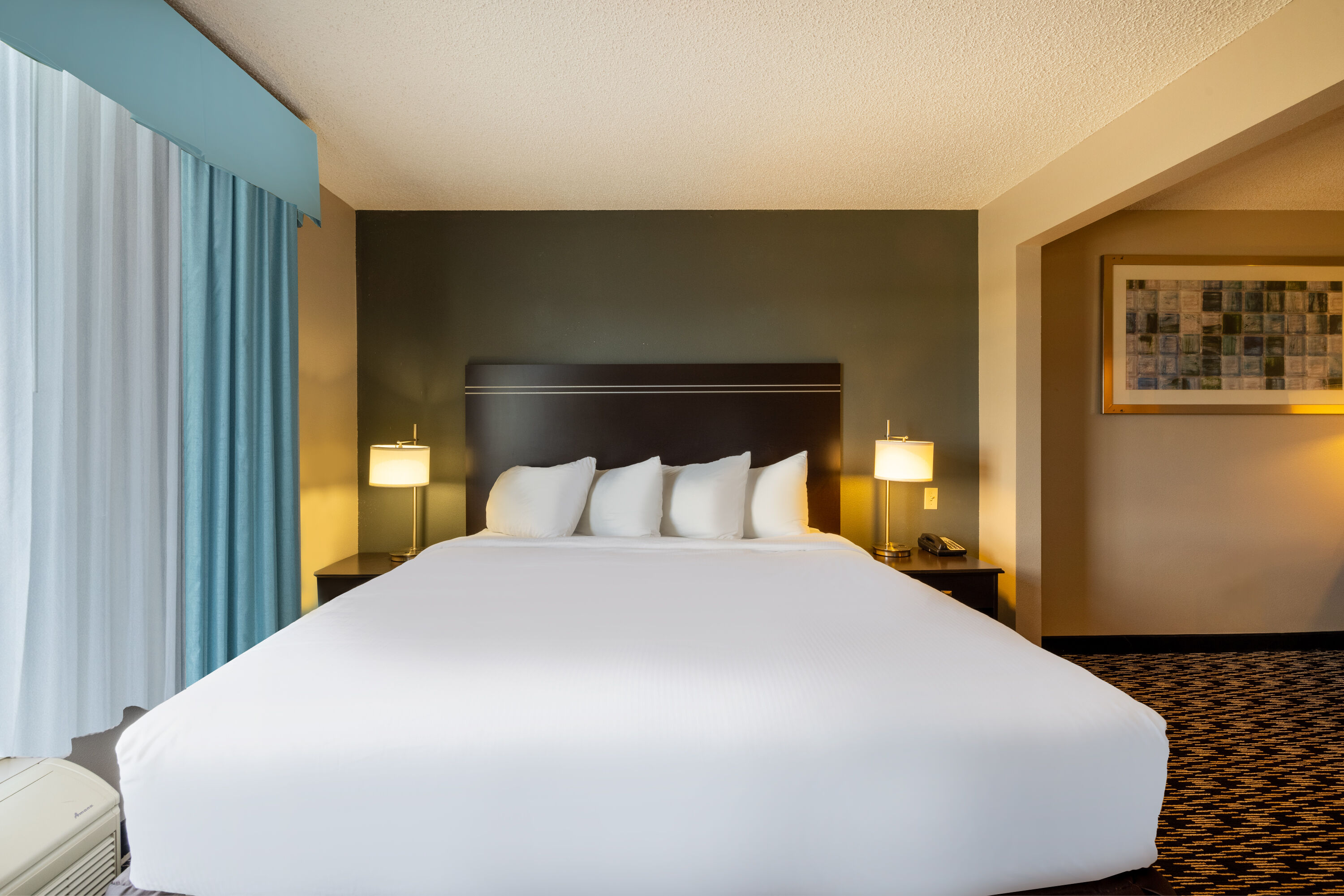 Guest room at the Wingate by Wyndham Gillette in Gillette, Wyoming