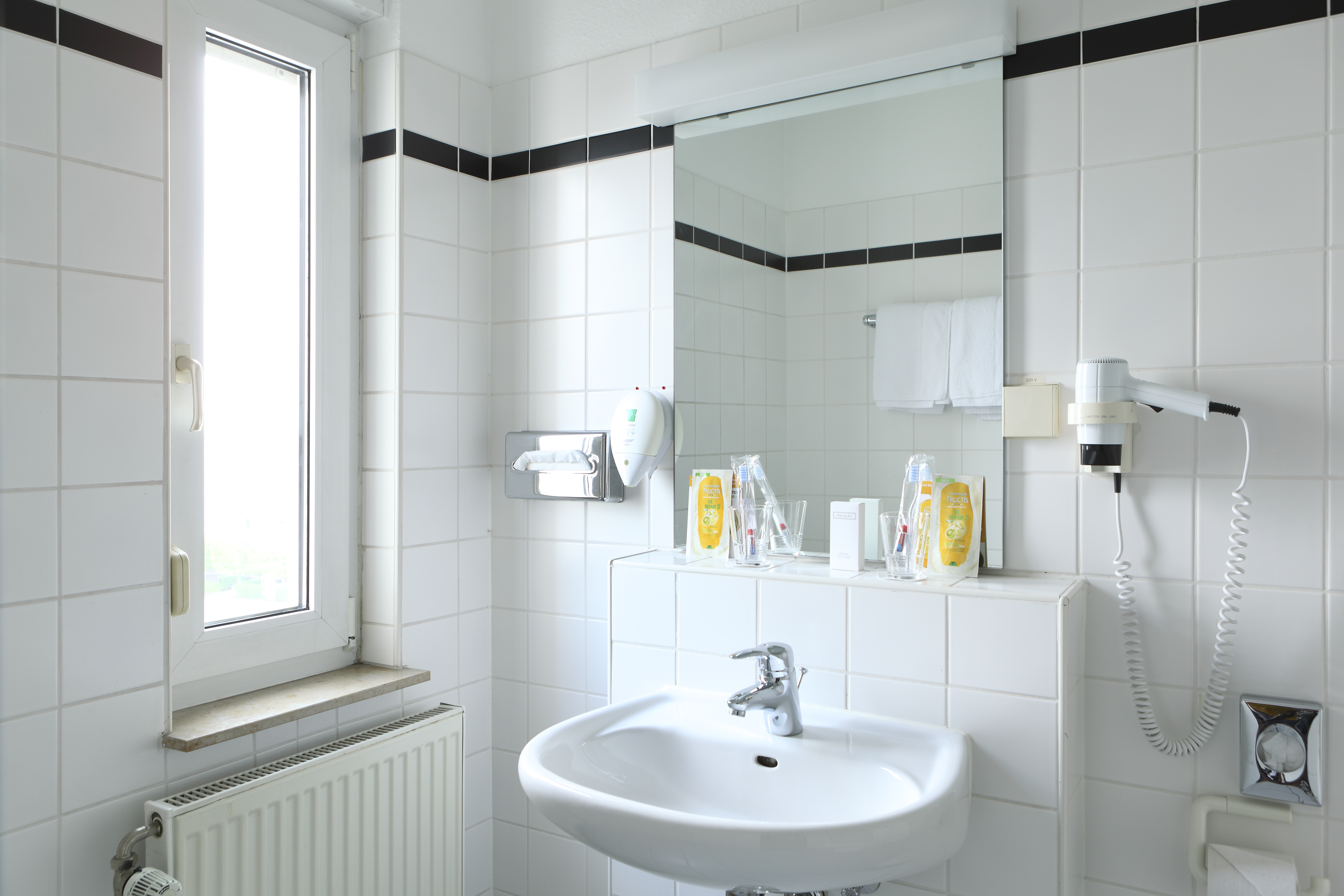 Guest room bath at the TRYP by Wyndham Bremen Airport in Bremen, Other than US/Canada