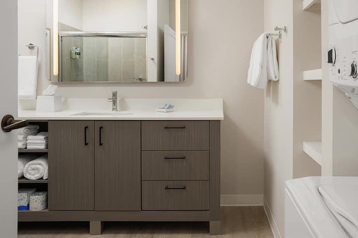 Guest room bath at the WaterWalk Extended Stay Huntsville in Huntsville, Alabama