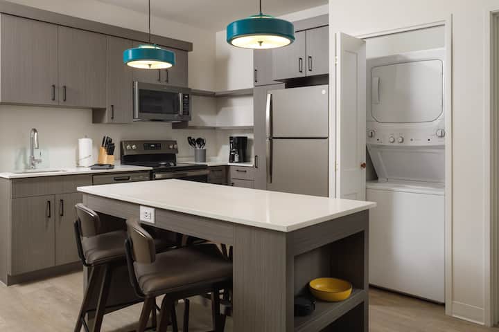 Guest room at the WaterWalk Extended Stay Huntsville in Huntsville, Alabama