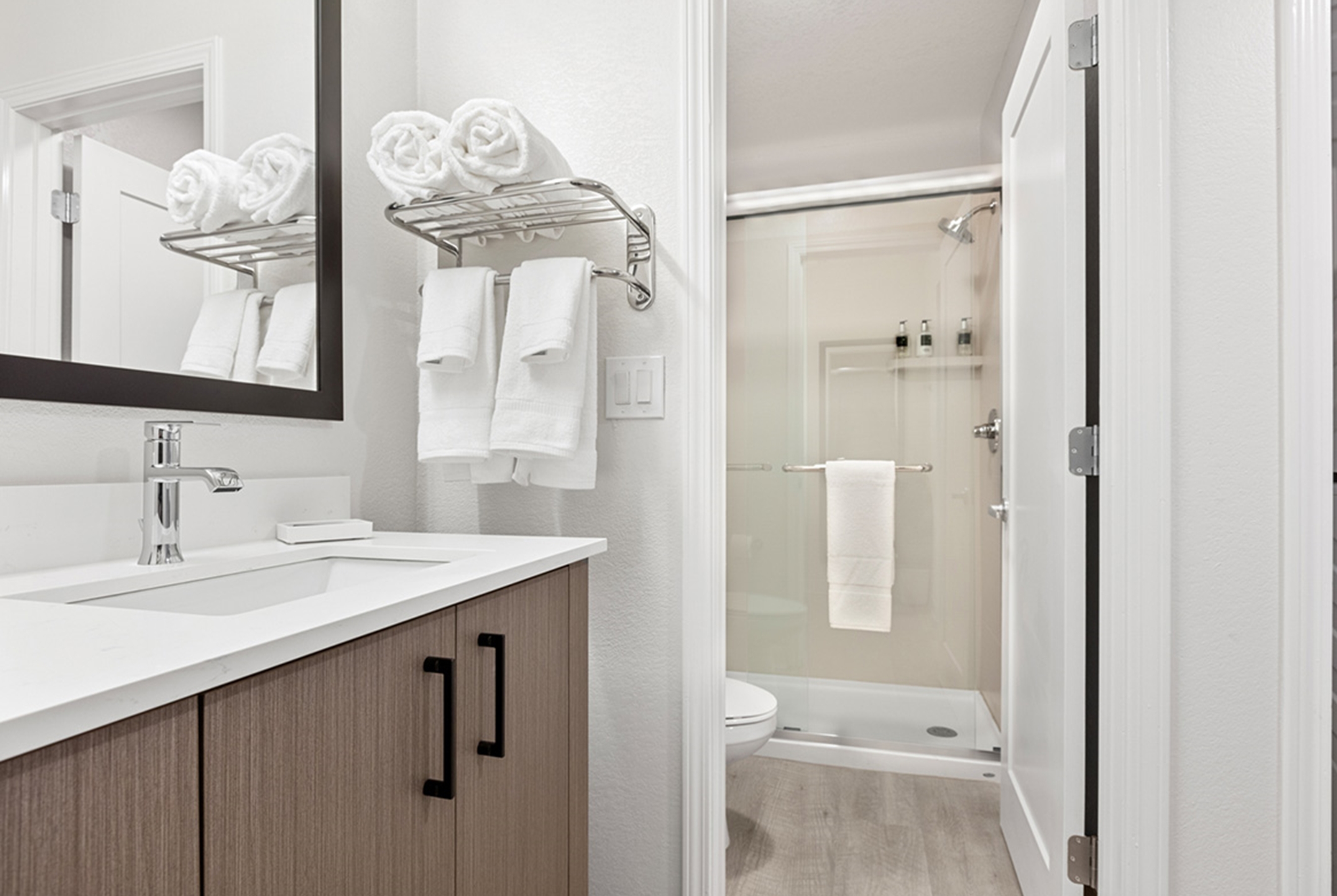 Guest room bath at the WaterWalk Extended Stay by Wyndham Atlanta Perimeter in Atlanta, Georgia