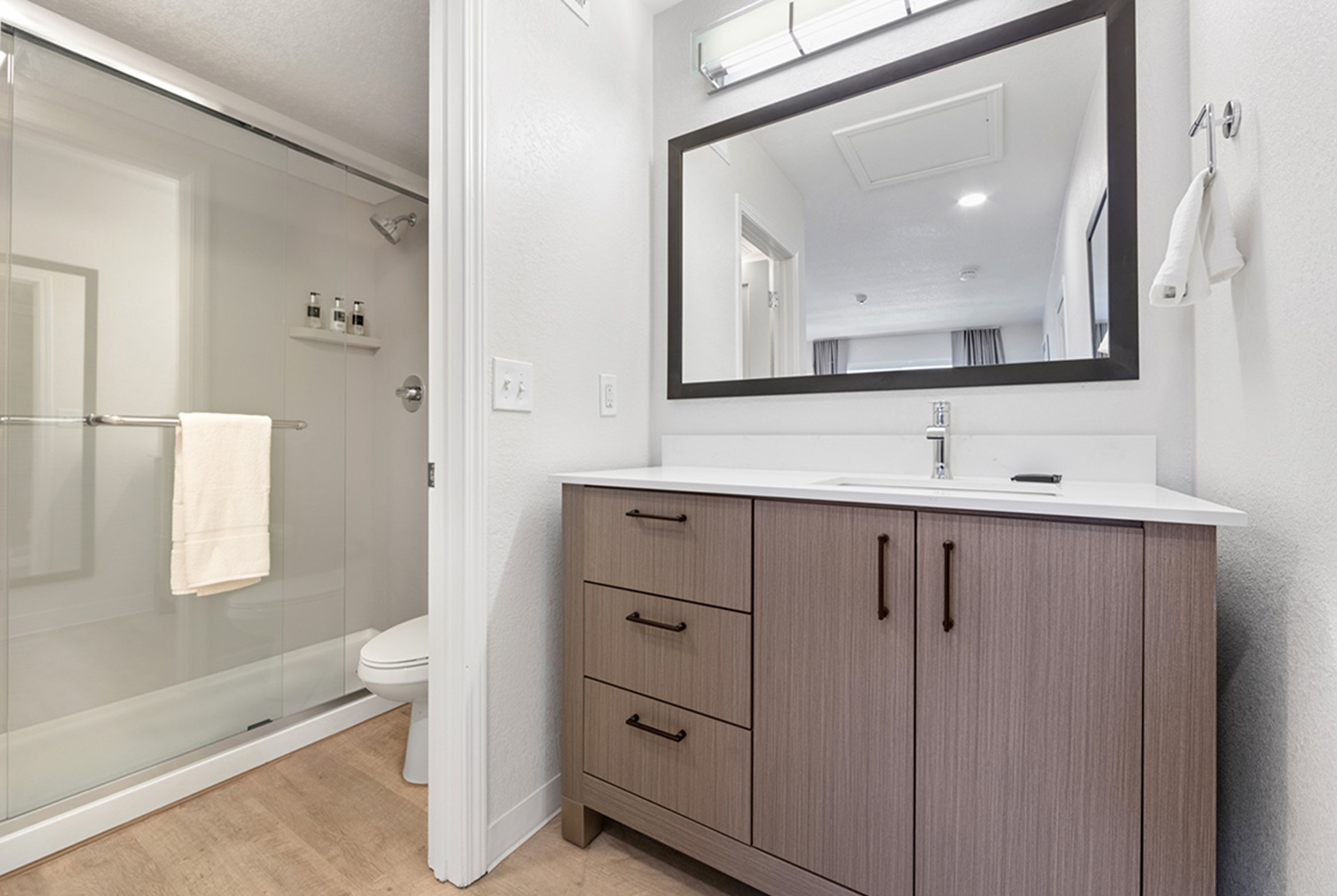 Guest room bath at the WaterWalk Extended Stay by Wyndham Atlanta Perimeter in Atlanta, Georgia