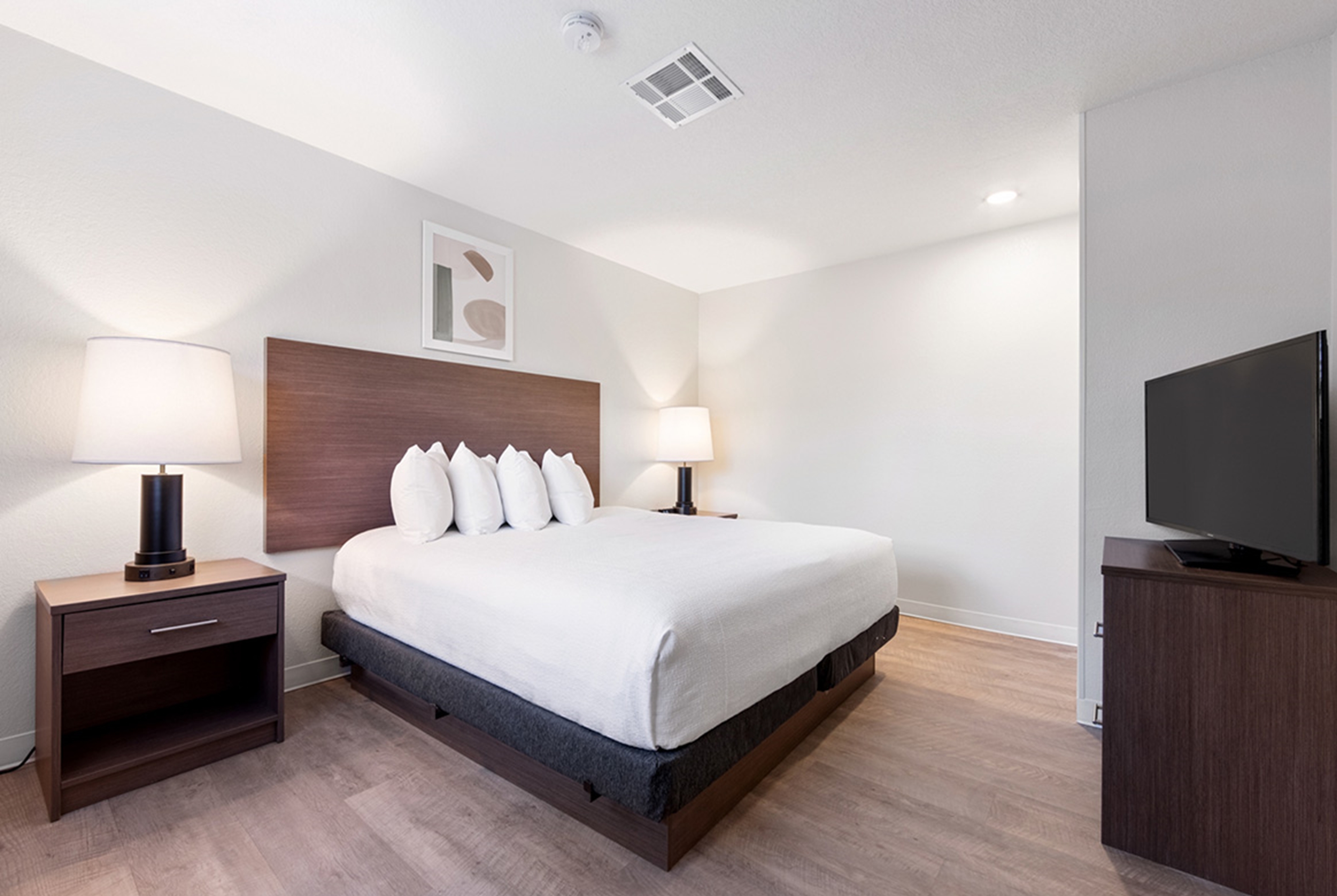Guest room at the WaterWalk Extended Stay by Wyndham Atlanta Perimeter in Atlanta, Georgia