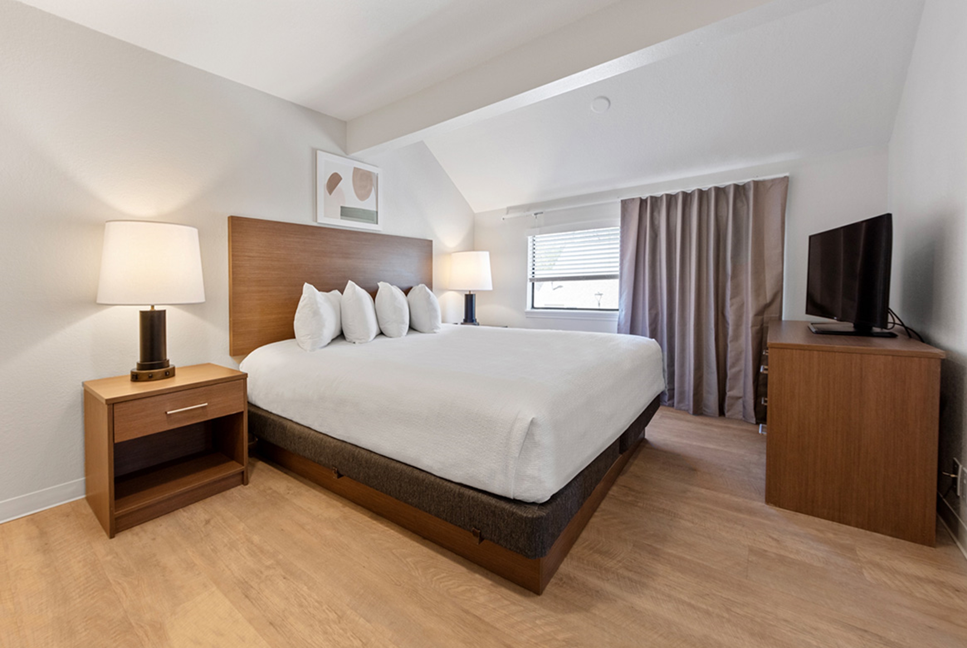 Guest room at the WaterWalk Extended Stay by Wyndham Atlanta Perimeter in Atlanta, Georgia