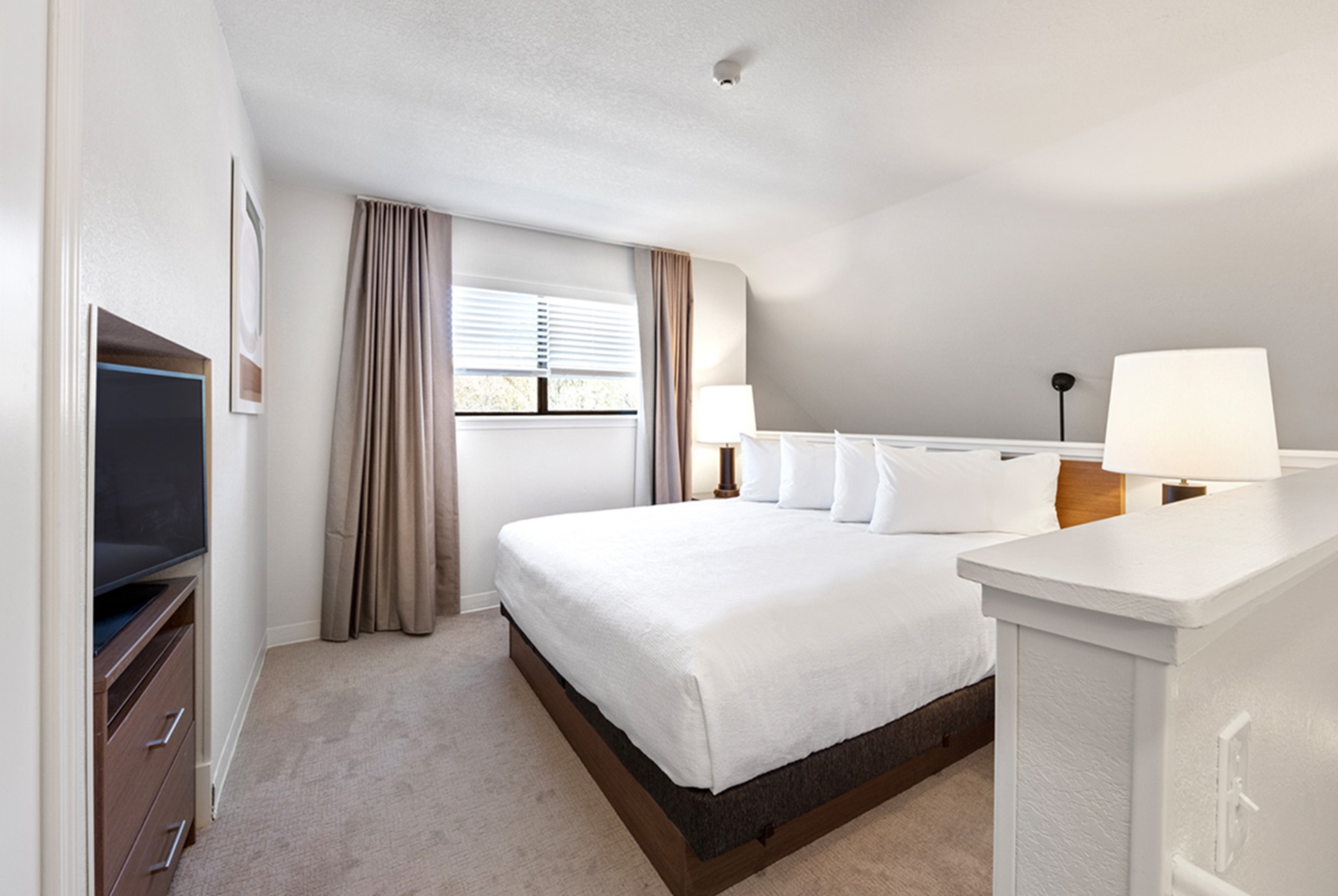 Guest room at the WaterWalk Extended Stay by Wyndham Atlanta Perimeter in Atlanta, Georgia