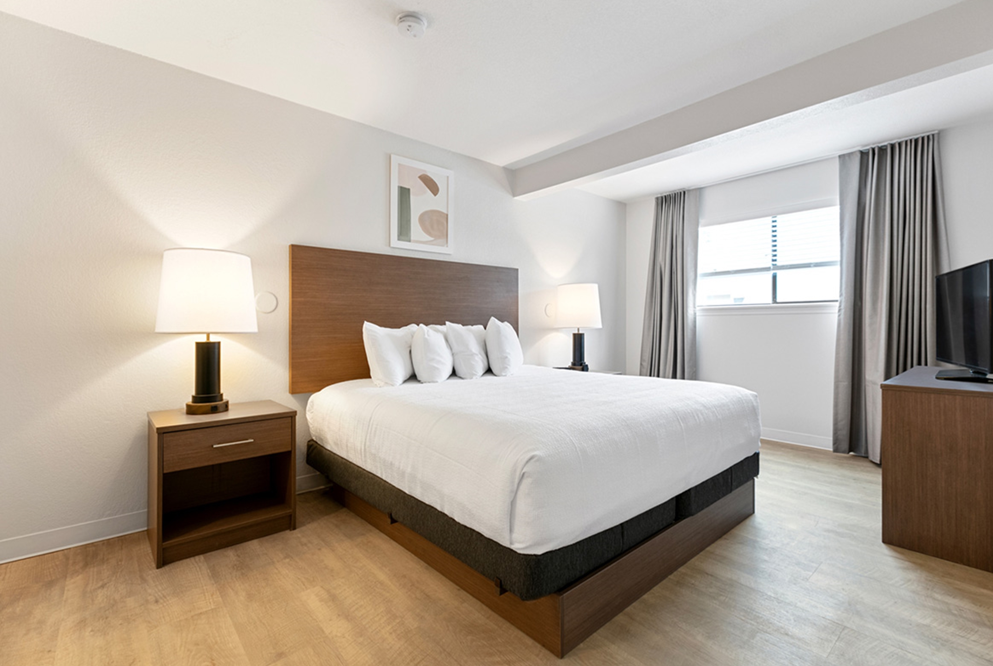 Guest room at the WaterWalk Extended Stay by Wyndham Atlanta Perimeter in Atlanta, Georgia