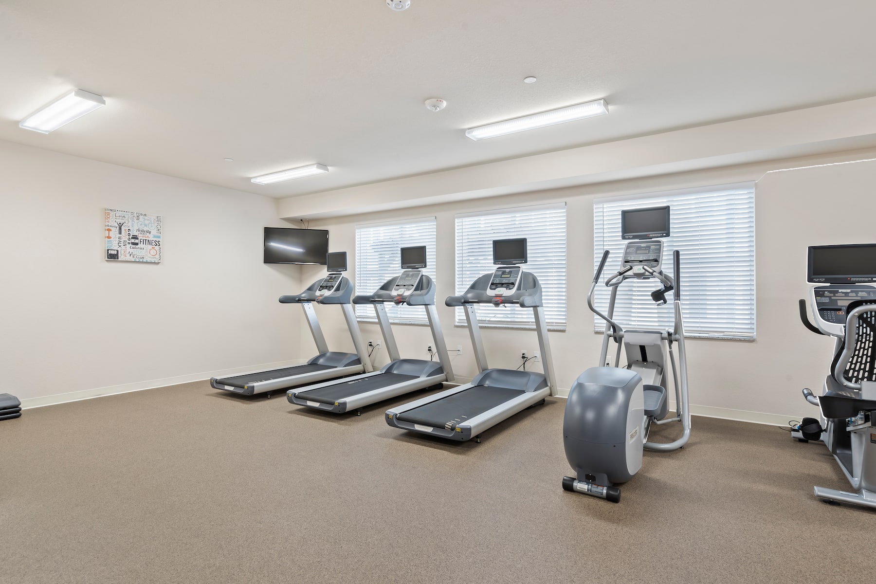 Fitness room at WaterWalk Extended Stay Kansas City - Overland Pk in Overland Park, Kansas