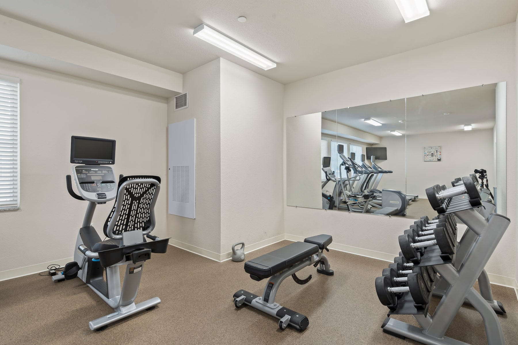 Fitness room at WaterWalk Extended Stay Kansas City - Overland Pk in Overland Park, Kansas