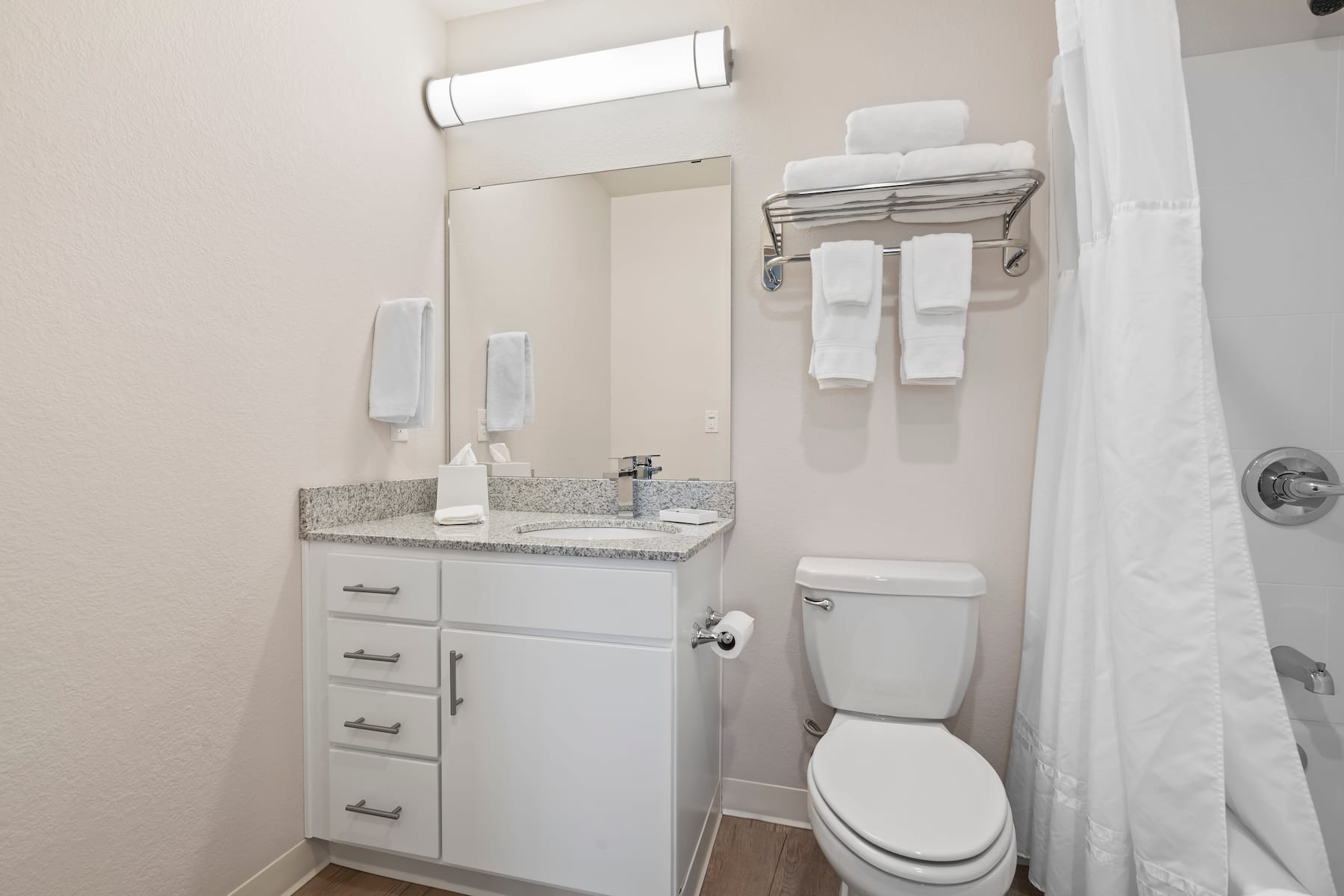 Guest room bath at the WaterWalk Extended Stay Kansas City - Overland Pk in Overland Park, Kansas