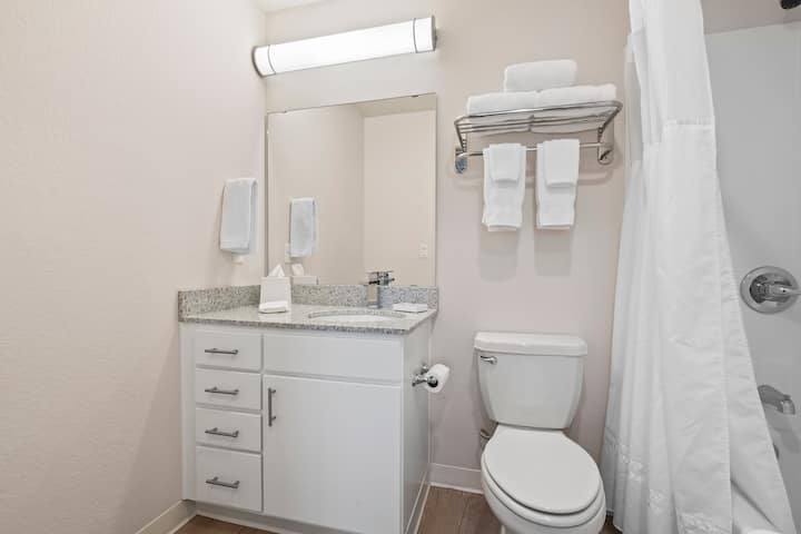 Guest room bath at the WaterWalk Extended Stay Kansas City - Overland Pk in Overland Park, Kansas