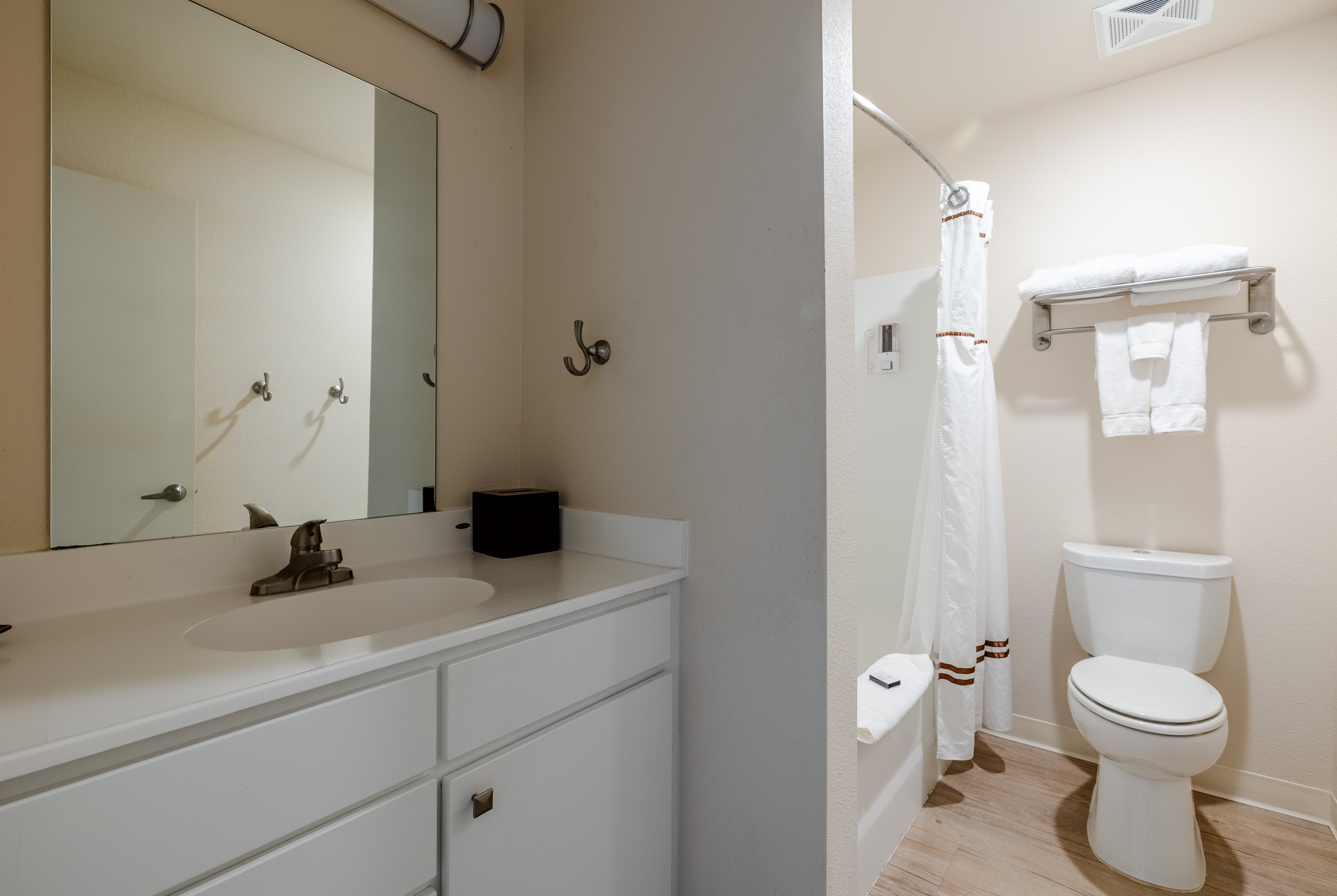 Guest room bath at the WaterWalk Extended Stay Wichita in Wichita, Kansas
