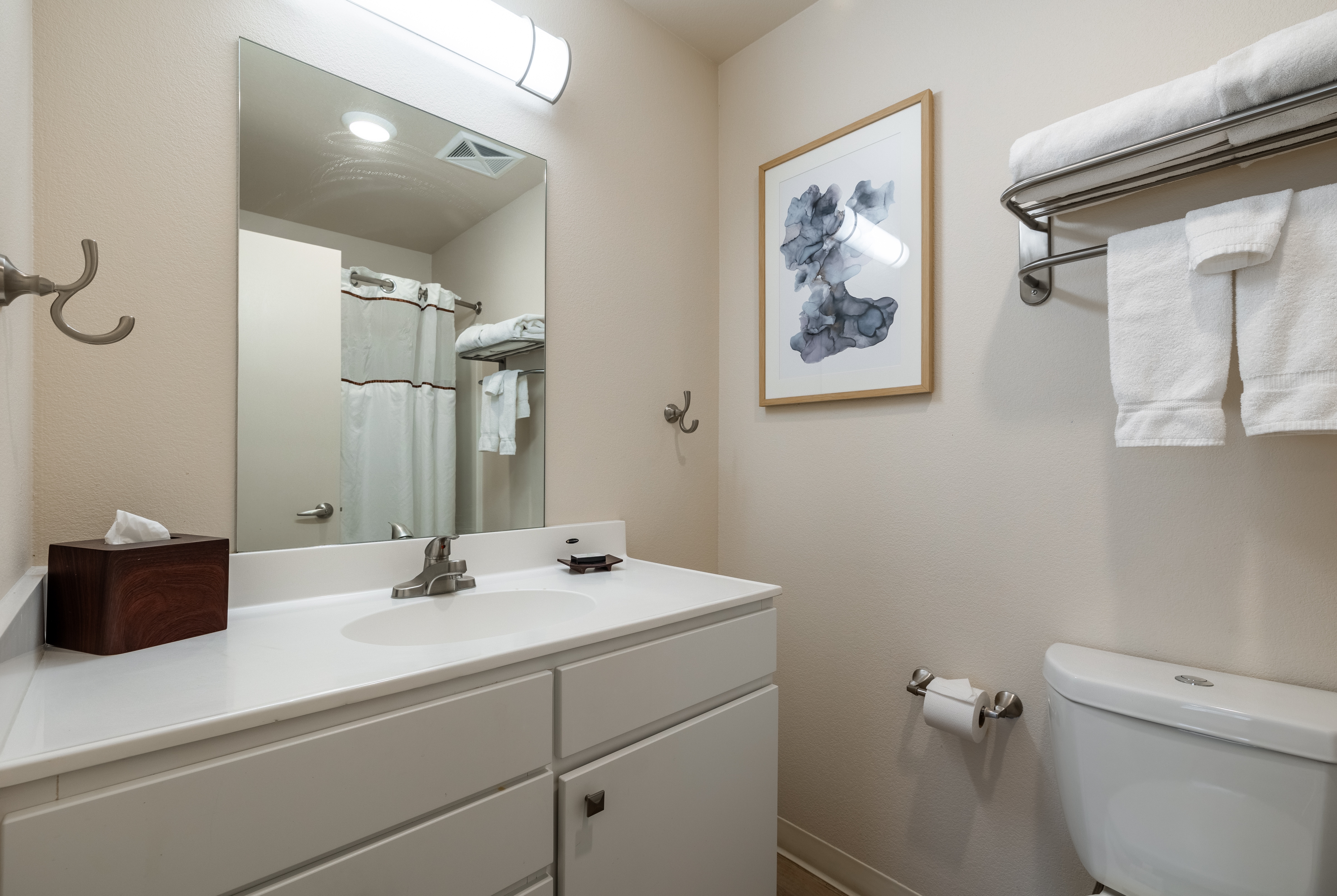 Guest room bath at the WaterWalk Extended Stay Wichita in Wichita, Kansas