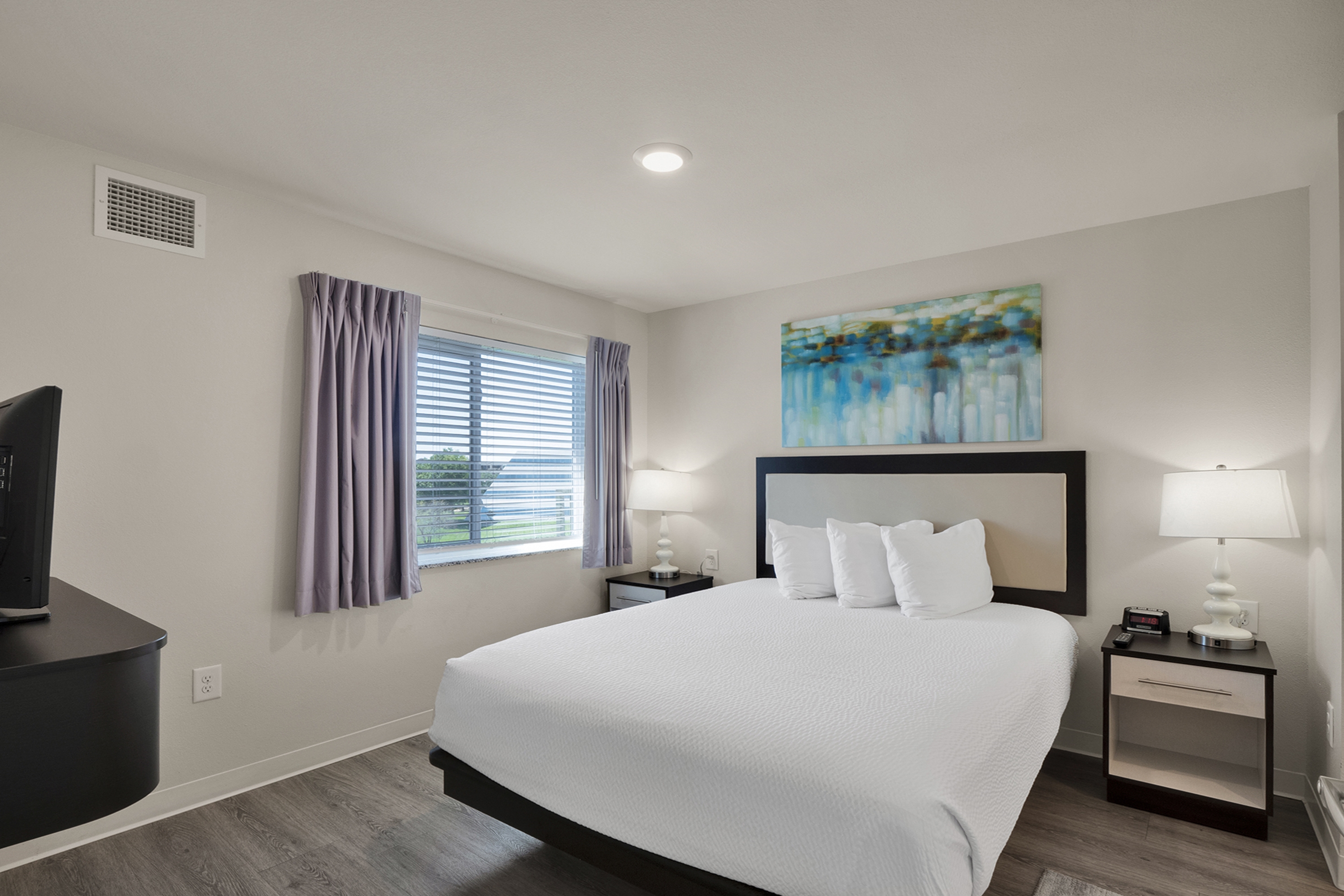 Guest room at the WaterWalk Extended Stay Raleigh Durham Research Triangle in Morrisville, North Carolina