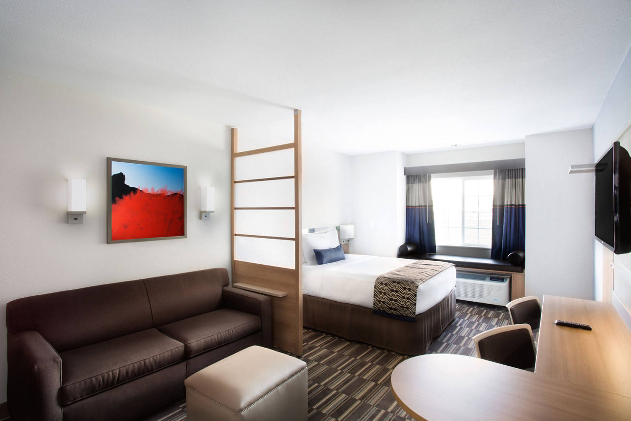 Oversized Guest Suite with 1 Queen Bed and Sofa Bed