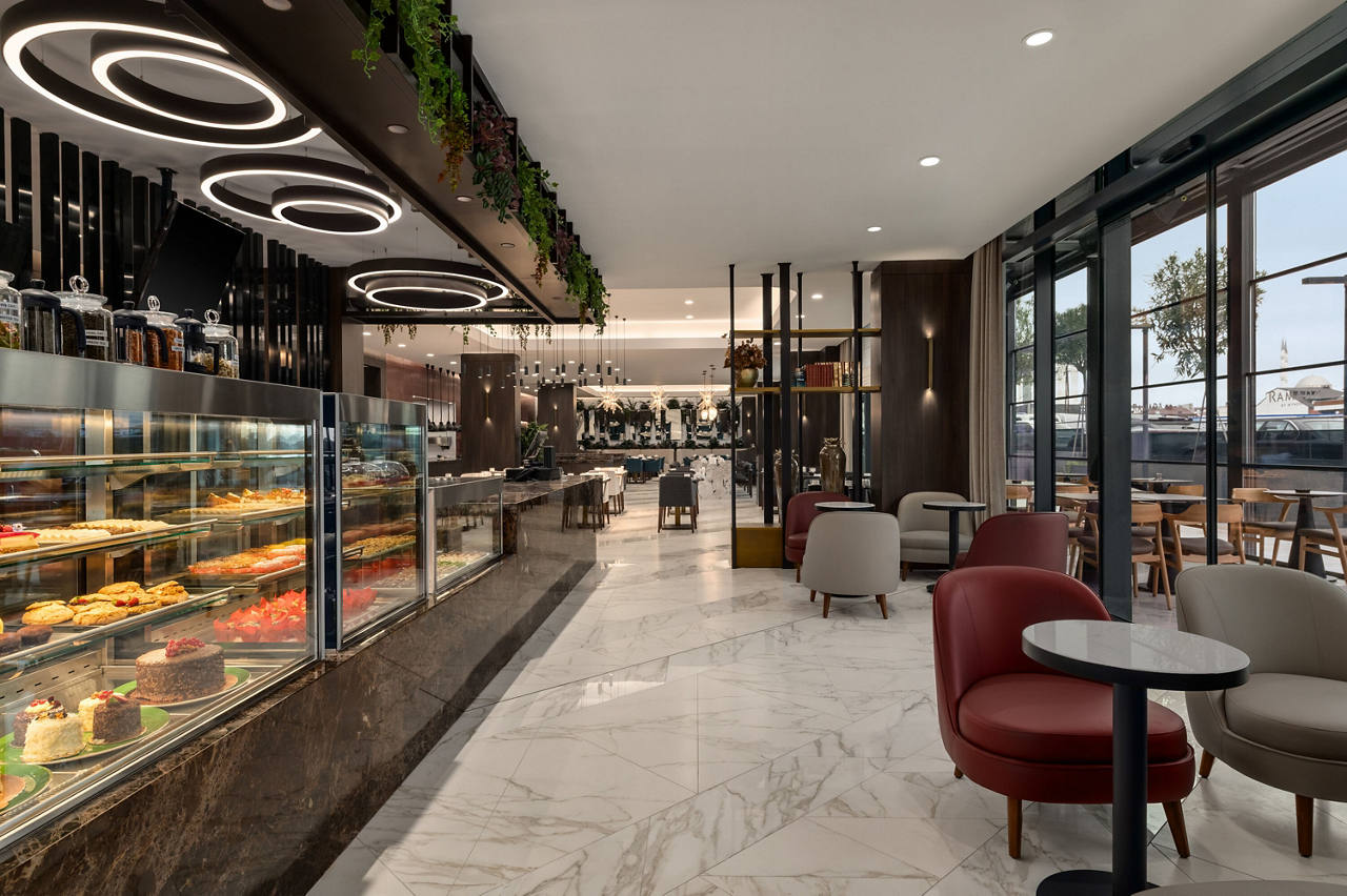 2025-12-09,  Istanbul,  Kivanc Sonmez,  Ramada by Wyndham Arnavutkoy,  Turkey,  Cafeteria,  Chair,  Desk,  Floor,  Flooring,  Furniture,  Indoors,  Lounge,  Person,  Restaurant,  Table