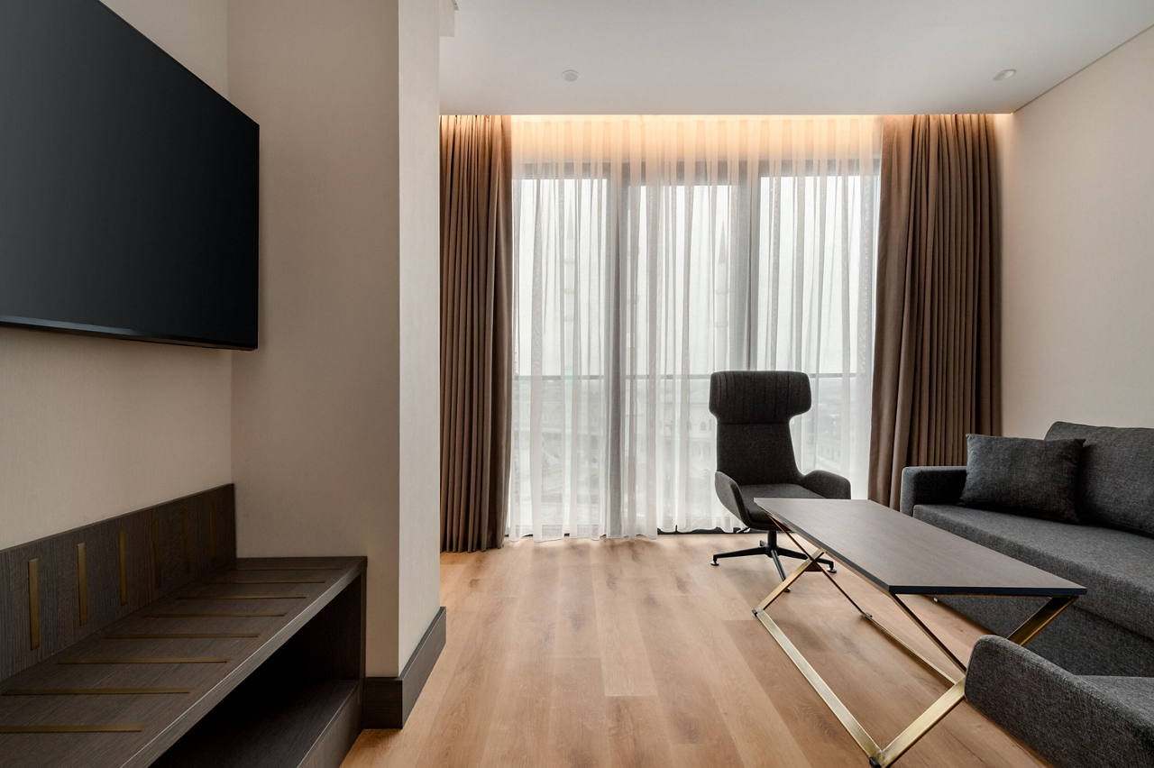 2025-12-09,  Istanbul,  Kivanc Sonmez,  Ramada by Wyndham Arnavutkoy,  Turkey,  Chair,  Computer Hardware,  Couch,  Electronics,  Floor,  Flooring,  Furniture,  Hardware,  Hardwood,  Indoors,  Interior Design,  Living Room,  Monitor,  Screen,  Wood